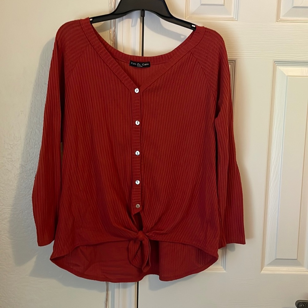 Burnt orange button up sweater size M.